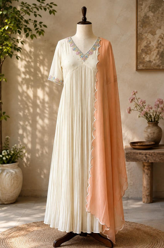 Ivory Georgette Pleated Gown with Pastel Embroidered V‑Neck & Peach Dupatta